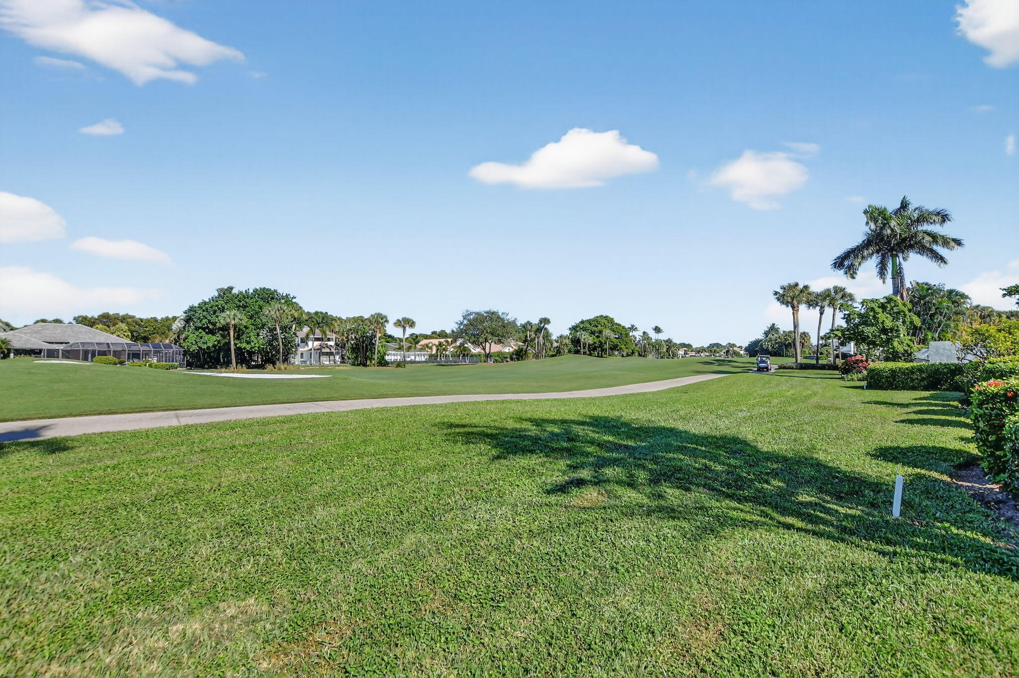 7567 Rexford Road Boca Raton, FL 33434 - Photo 58 of 95 a view of a golf course with a lake