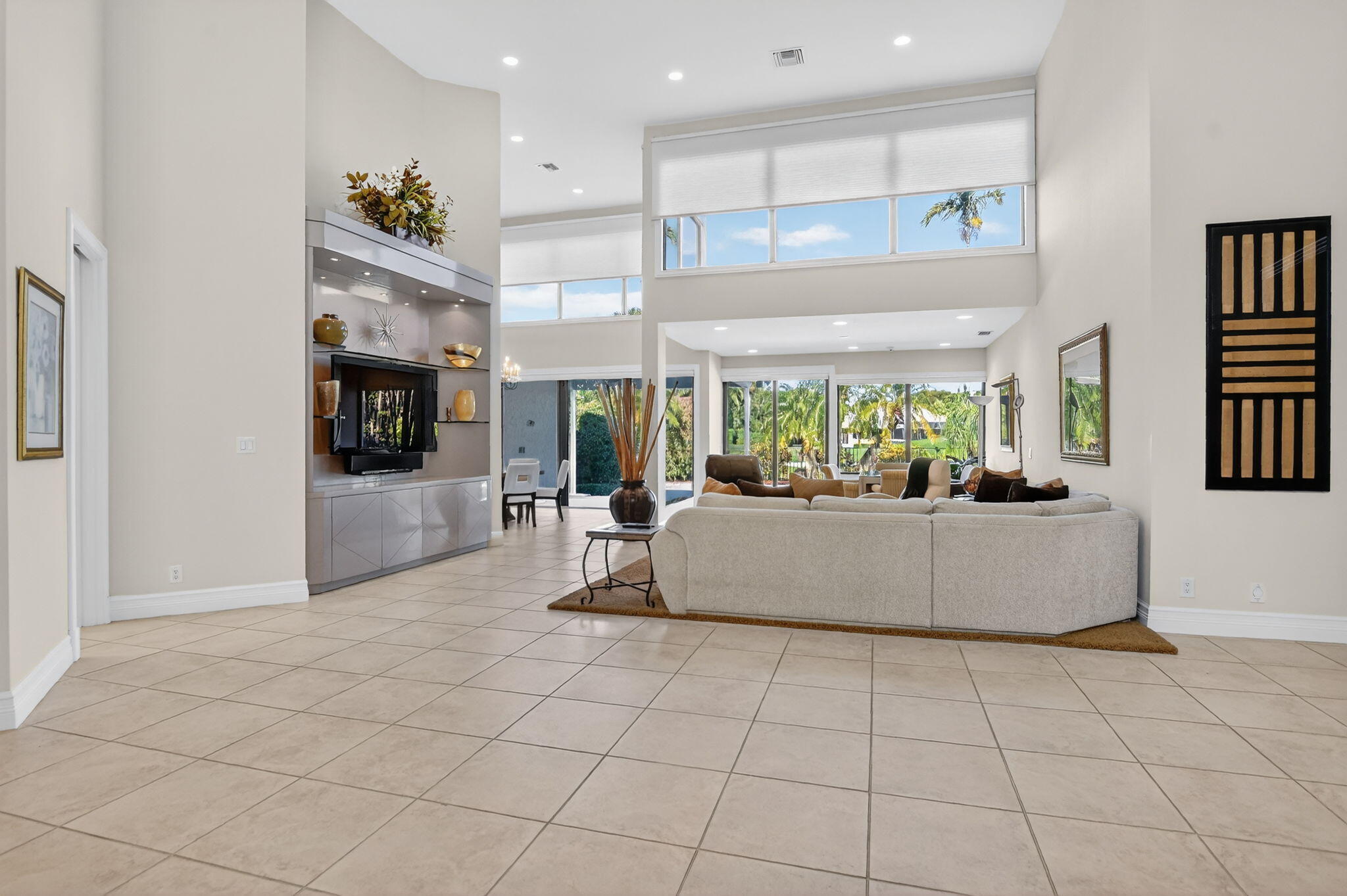 7567 Rexford Road Boca Raton, FL 33434 - Photo 6 of 95 a living room with furniture and a flat screen tv