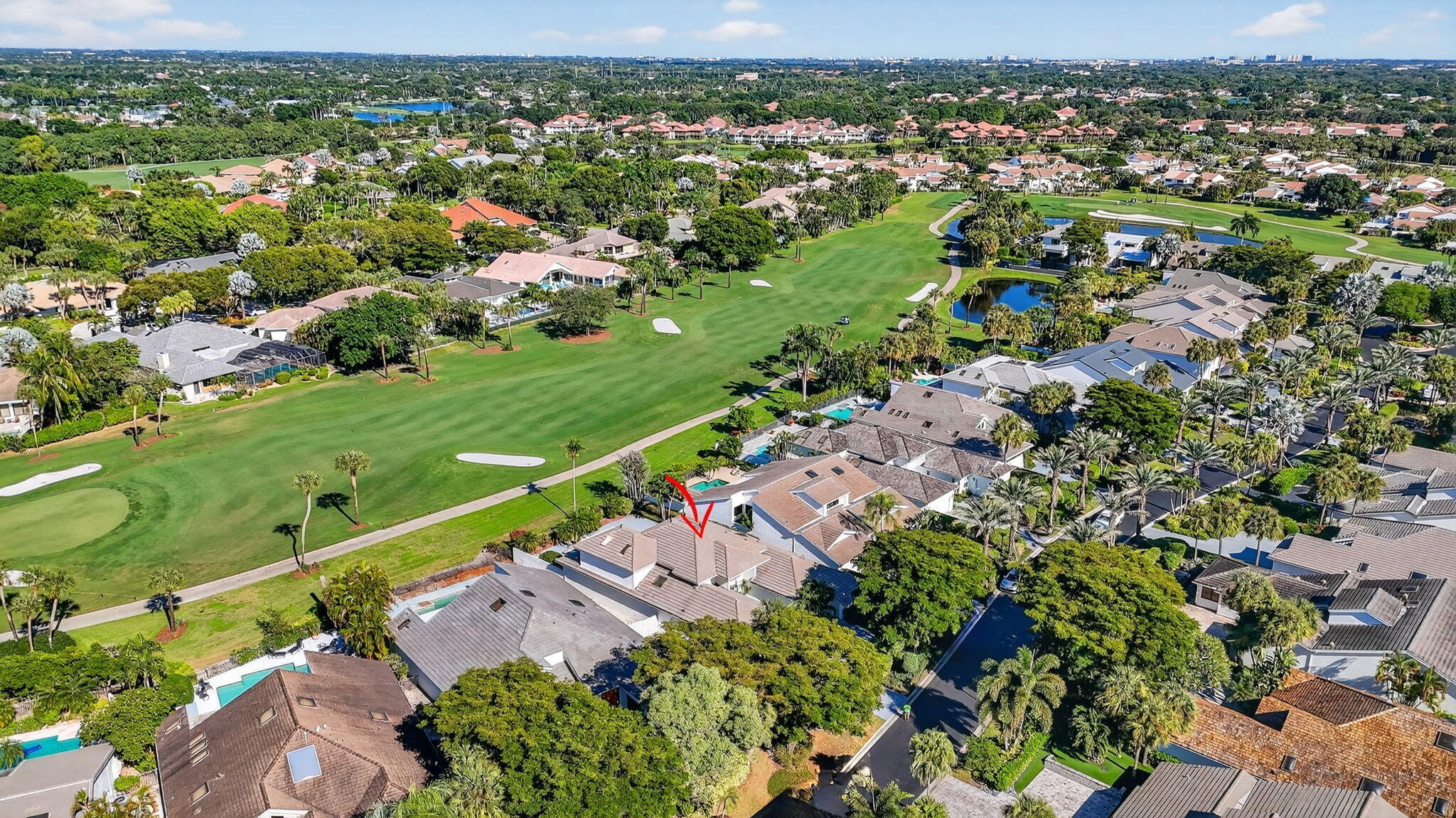 7567 Rexford Road Boca Raton, FL 33434 - Photo 65 of 95 an aerial view of a city with lots of residential buildings