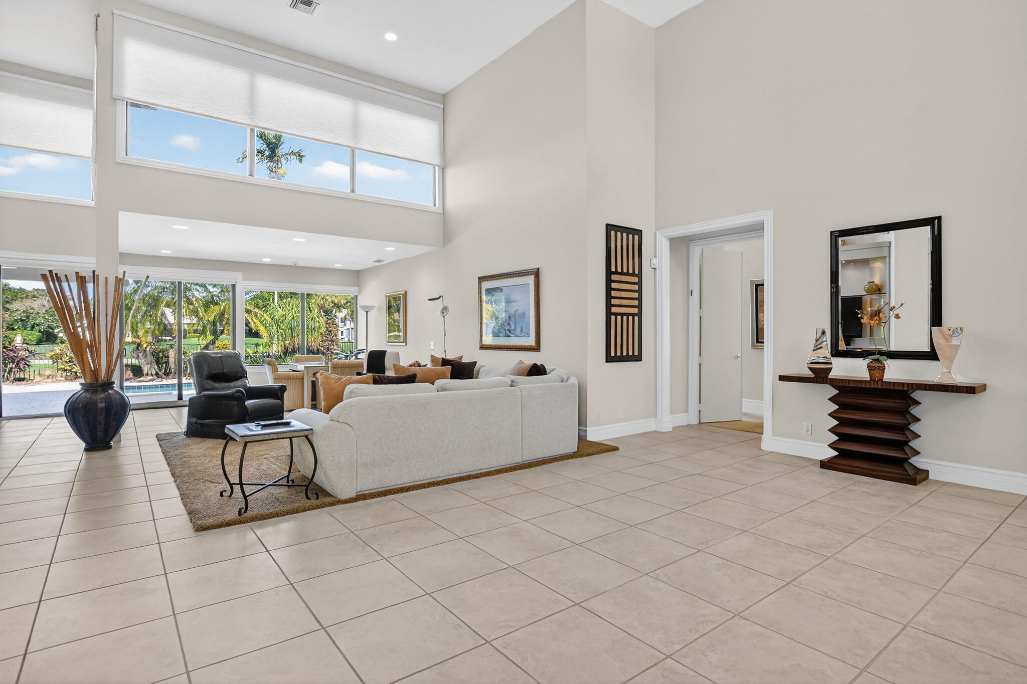 7567 Rexford Road Boca Raton, FL 33434 - Photo 7 of 95 a living room with furniture and wooden floor
