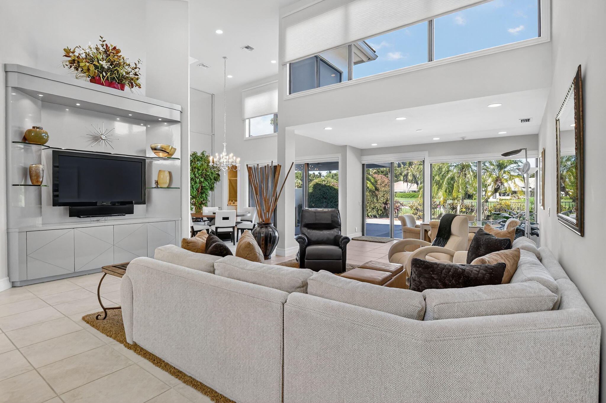 7567 Rexford Road Boca Raton, FL 33434 - Photo 8 of 95 a living room with furniture and a flat screen tv