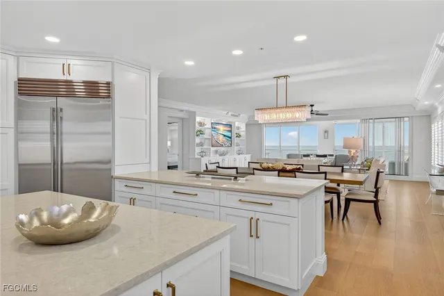 a kitchen with a sink cabinets and window