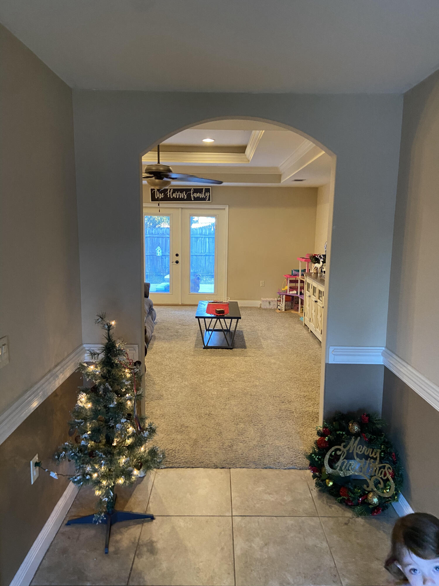 516 Grand Ridge Drive Crestview, FL 32539 - Photo 13 of 30 a living room with furniture and a chandelier