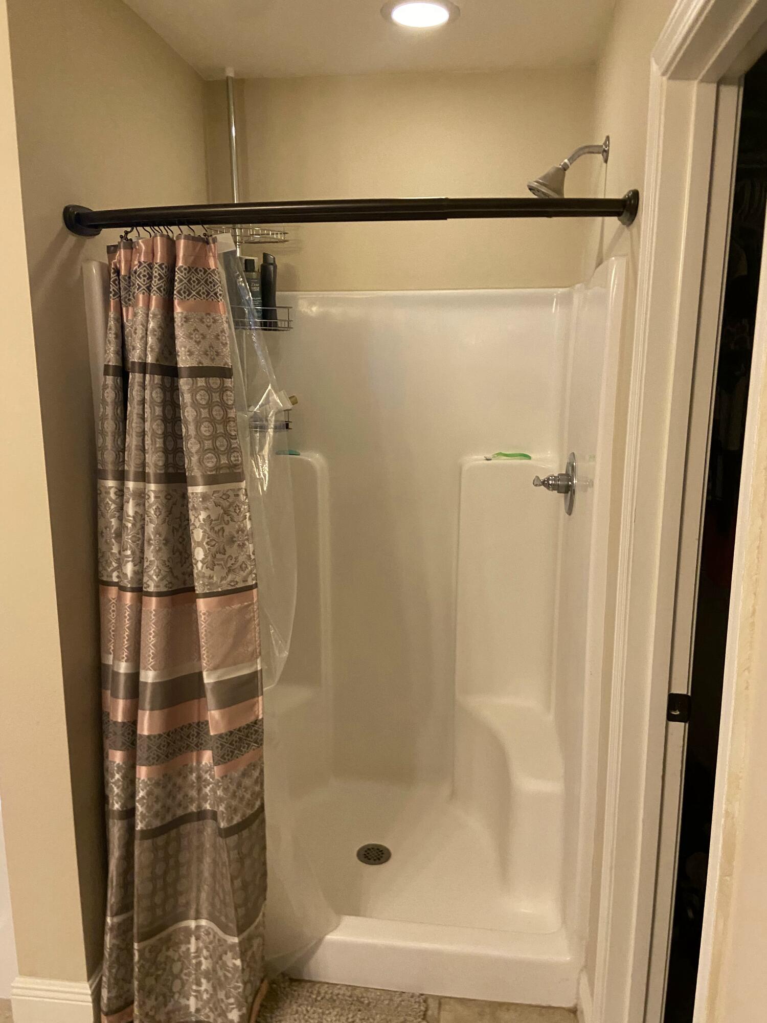 516 Grand Ridge Drive Crestview, FL 32539 - Photo 24 of 30 a bathroom with a shower