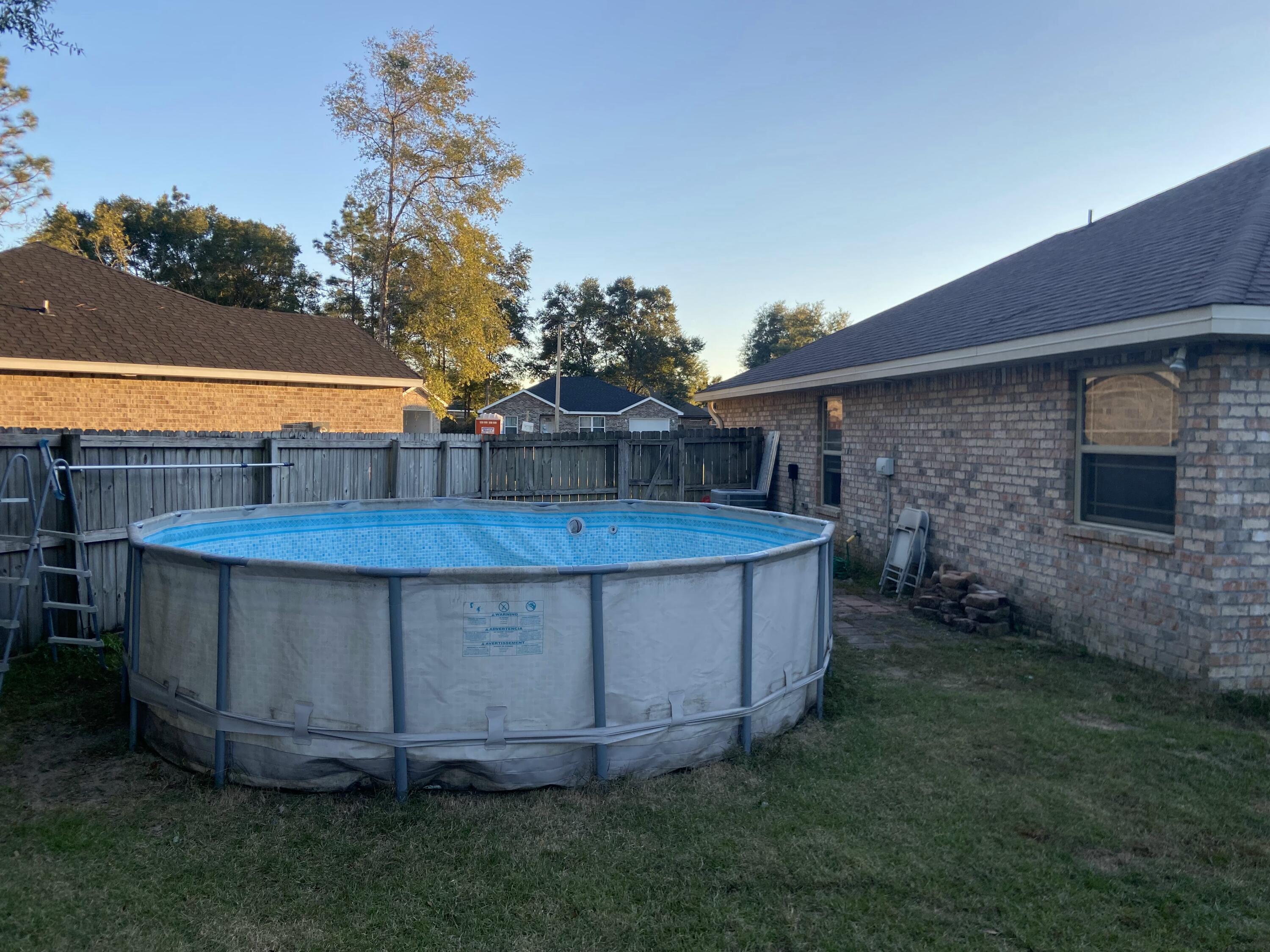 516 Grand Ridge Drive Crestview, FL 32539 - Photo 28 of 30 a view of a backyard