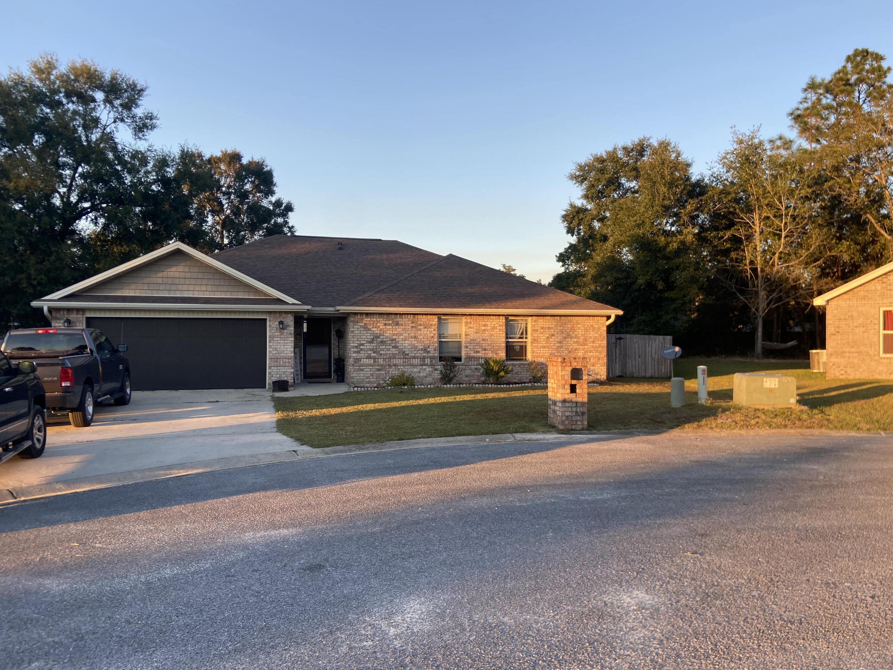 516 Grand Ridge Drive Crestview, FL 32539 - Photo 6 of 30 a front view of a house with a yard and garage
