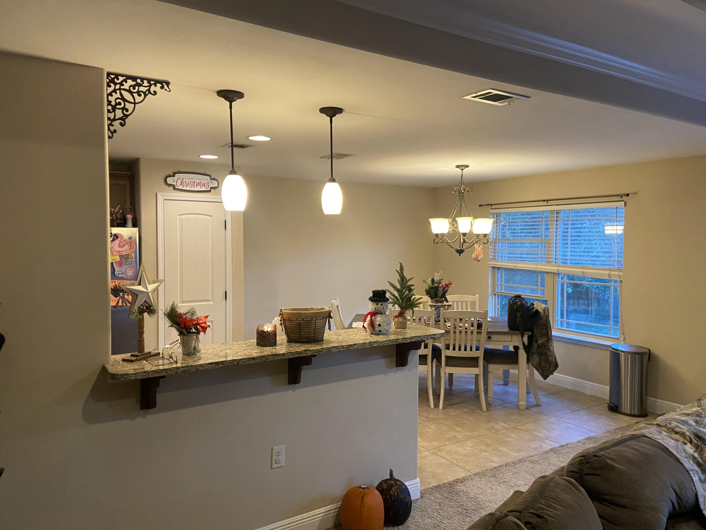 516 Grand Ridge Drive Crestview, FL 32539 - Photo 9 of 30 a view of a dining room with furniture