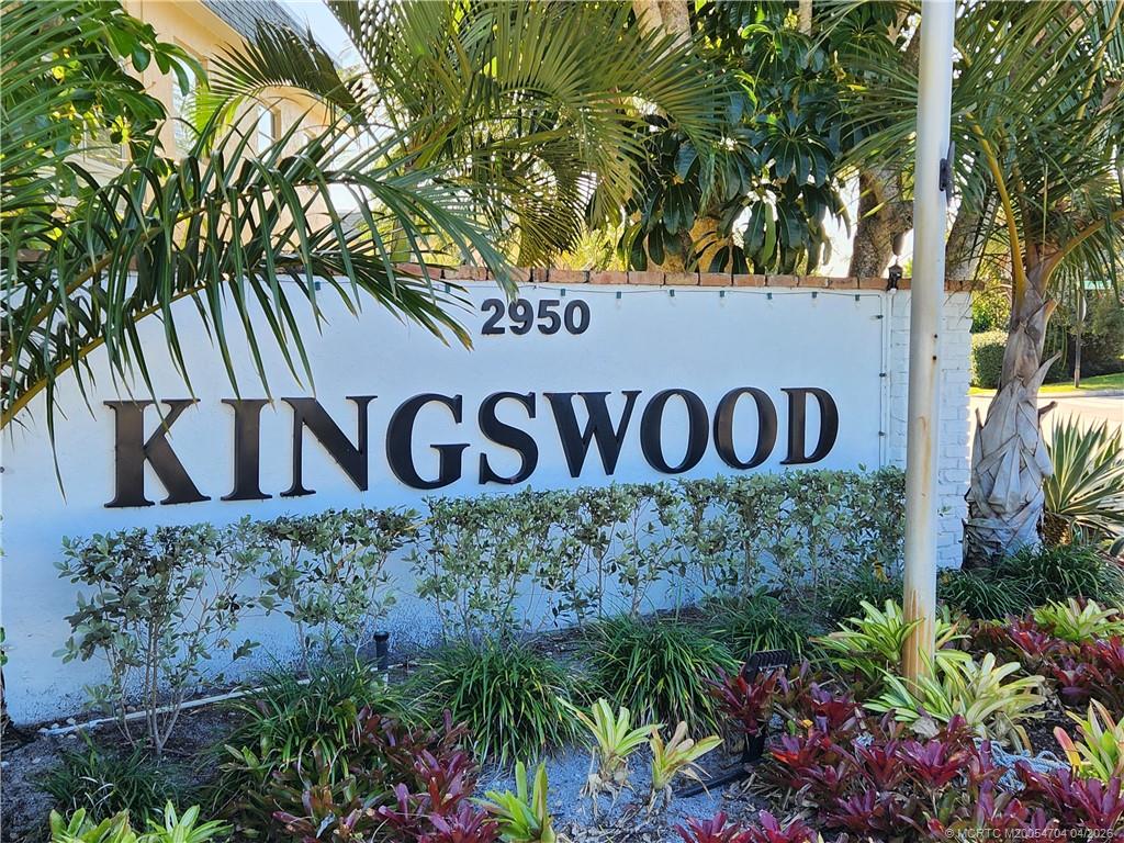 2950 Southeast Ocean Boulevard, Unit 311 Stuart, FL 34996 - Photo 3 of 16 a sign broad in front of flowers