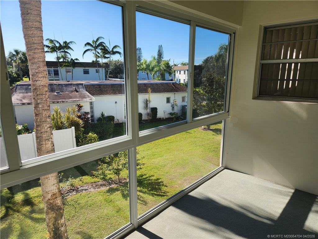 2950 Southeast Ocean Boulevard, Unit 311 Stuart, FL 34996 - Photo 5 of 16 a view of swimming pool from a balcony