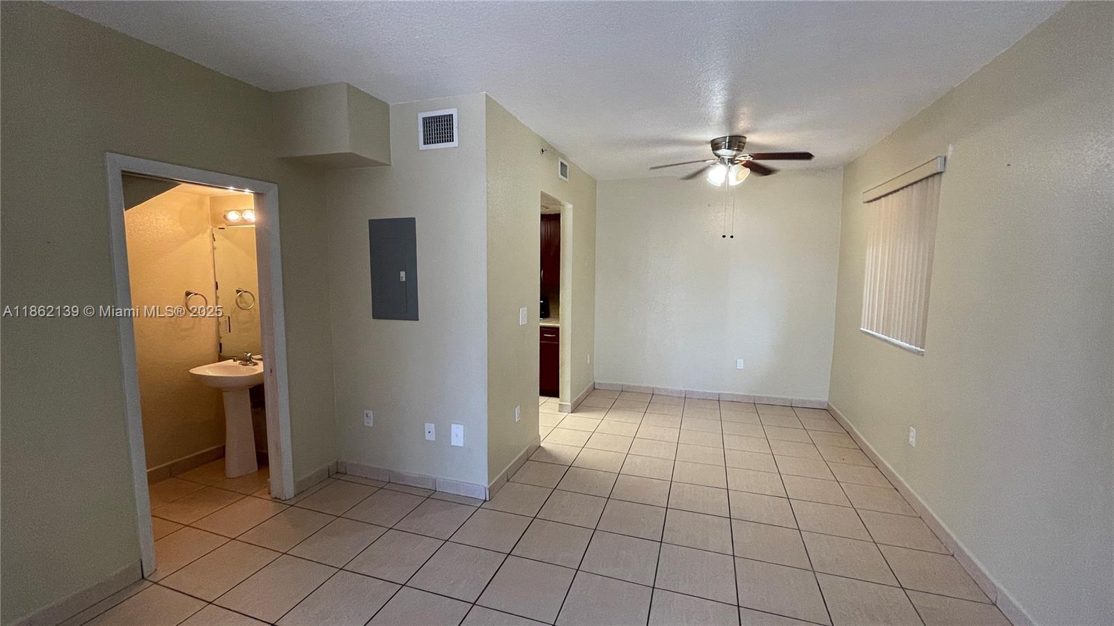 318 East 6th Street, Unit 101 Hialeah, FL 33010 - Photo 5 of 15 Living-Dining