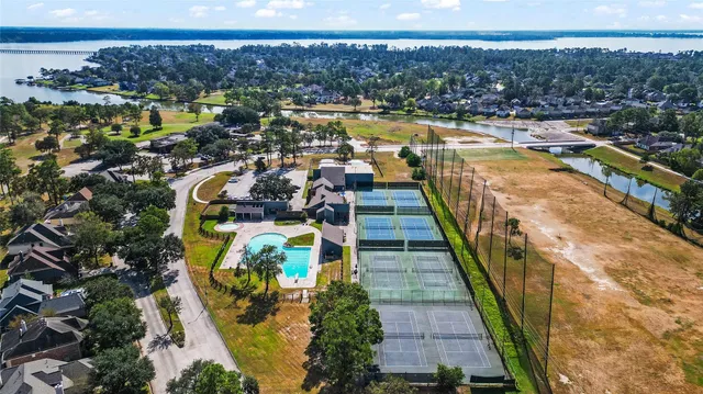 an aerial view of a house having yard