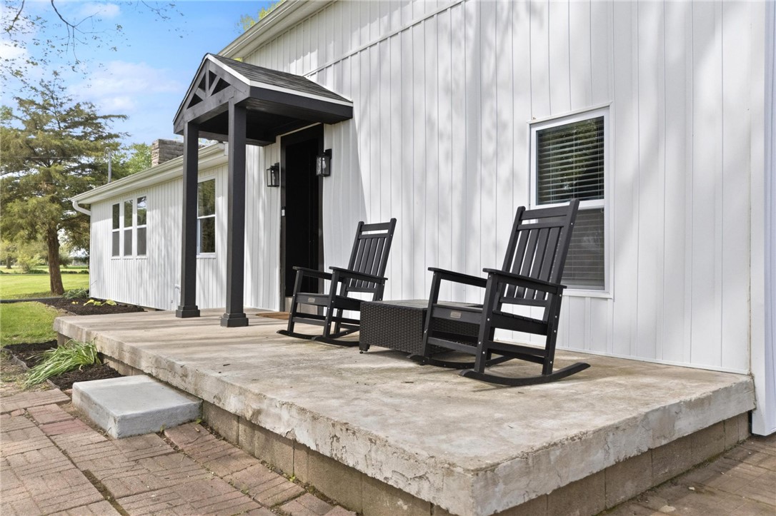 2950 Fairfield Pike Springfield, OH 45502 - Photo 5 of 48 This inviting white house features a welcoming porch, perfect for relaxing.