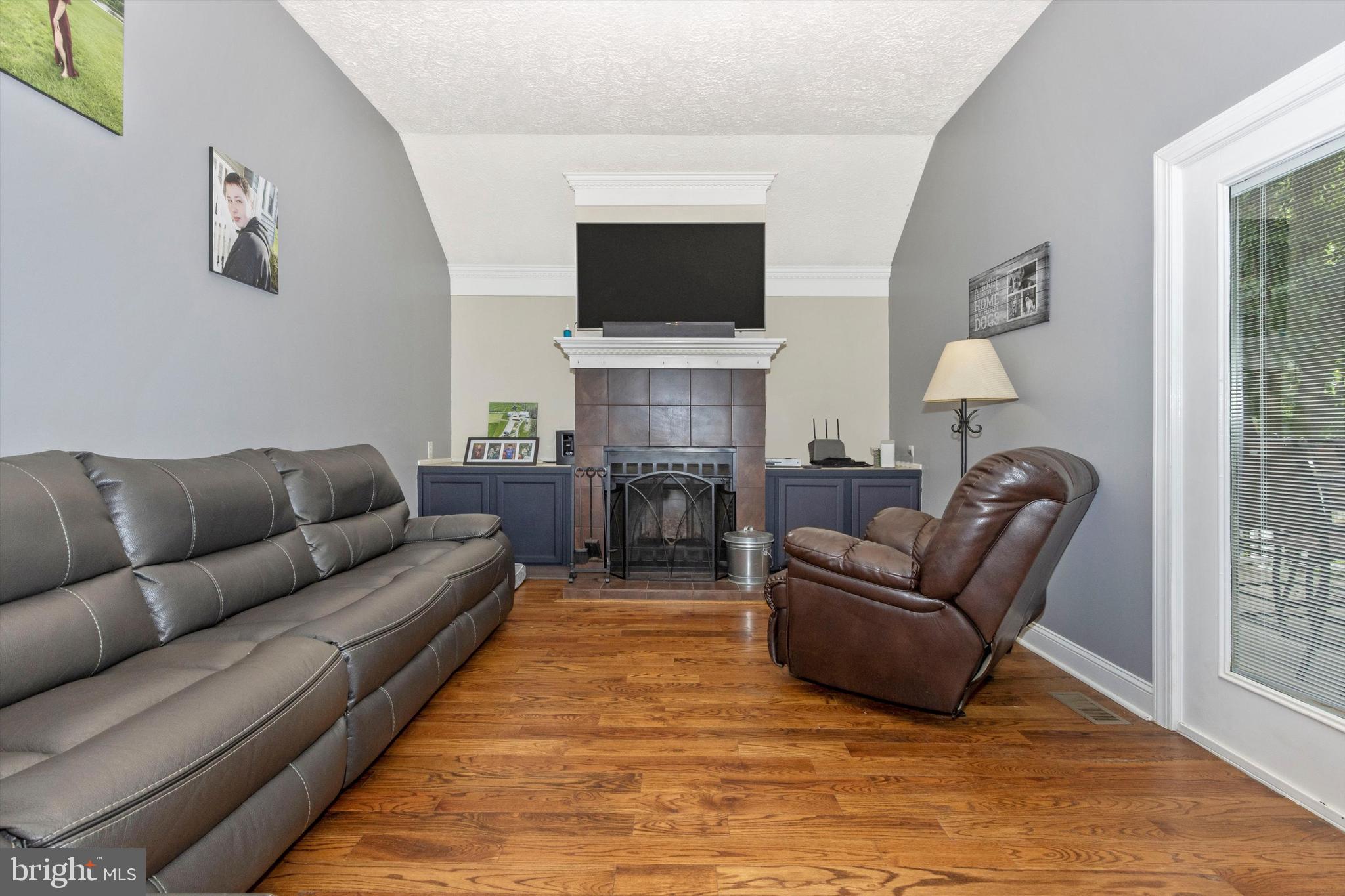 6701 Hemlock Point Road New Market, MD 21774 - Photo 16 of 52 family room with wood fireplace