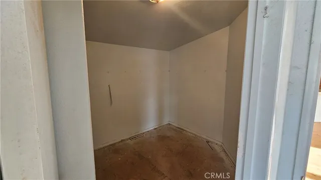 a utility room with sink dryer and washer