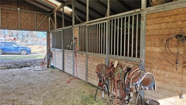 a view of a room with a wooden door