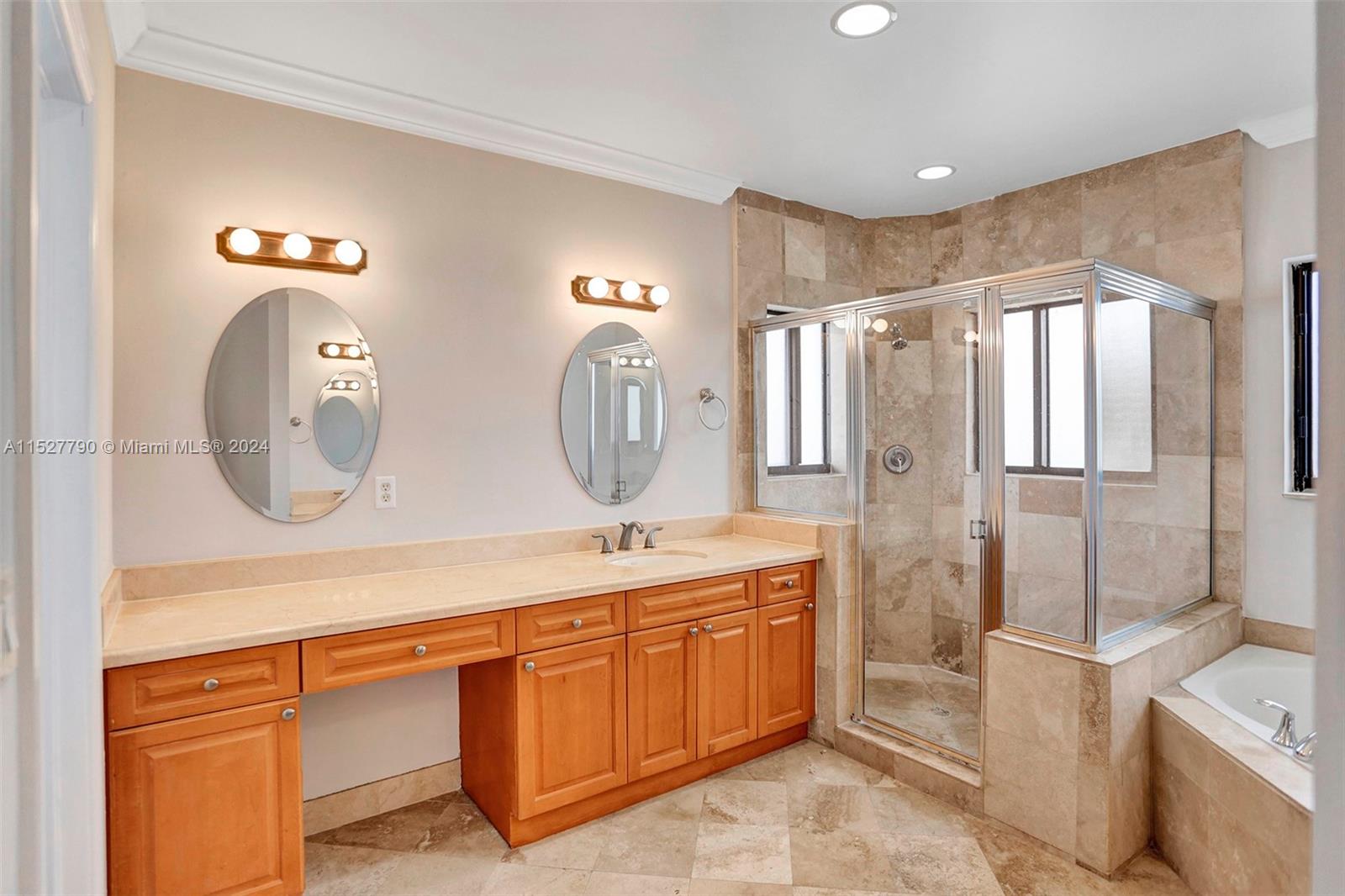 Ocean Vue Deerfield Beach, FL 33441 - Photo 64 of 93 a bathroom with a double vanity sink mirror and bathtub