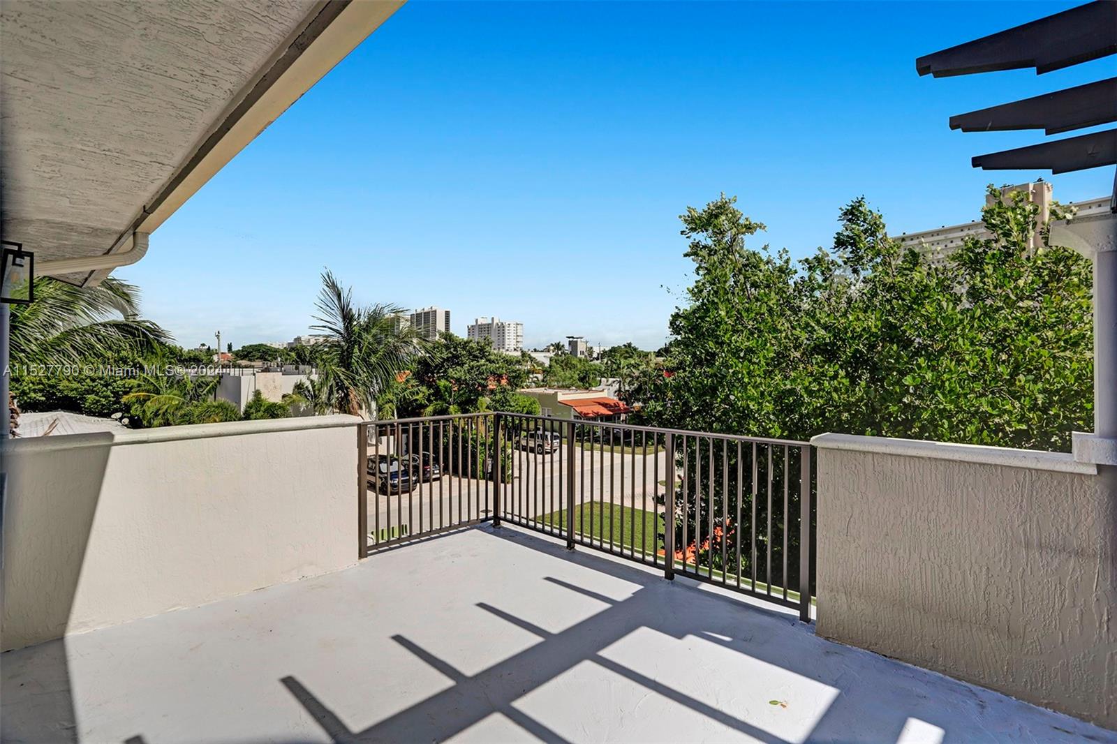 Ocean Vue Deerfield Beach, FL 33441 - Photo 82 of 93 a view of balcony with wooden floor and fence