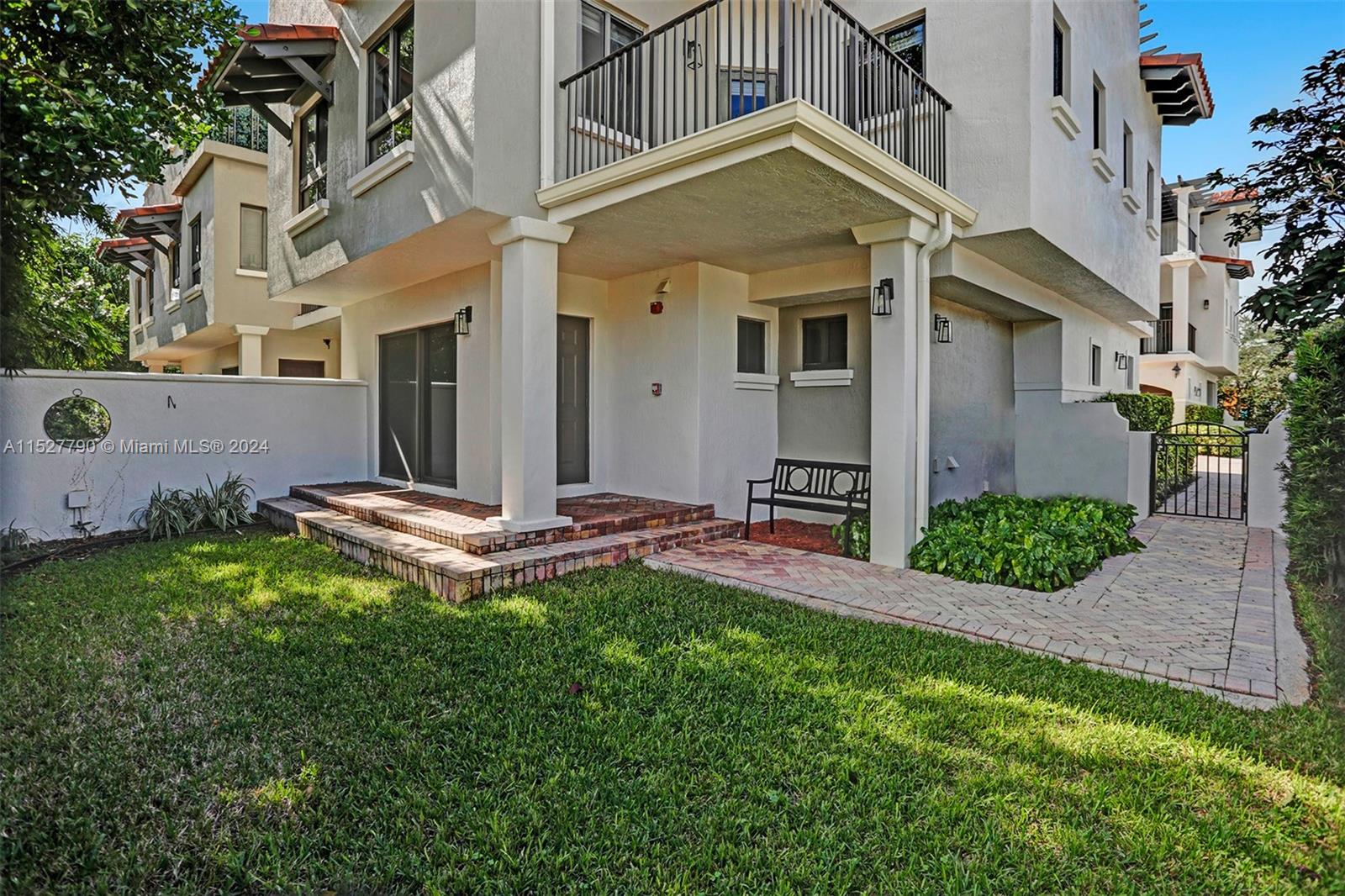 Ocean Vue Deerfield Beach, FL 33441 - Photo 83 of 93 a front view of a house with a yard