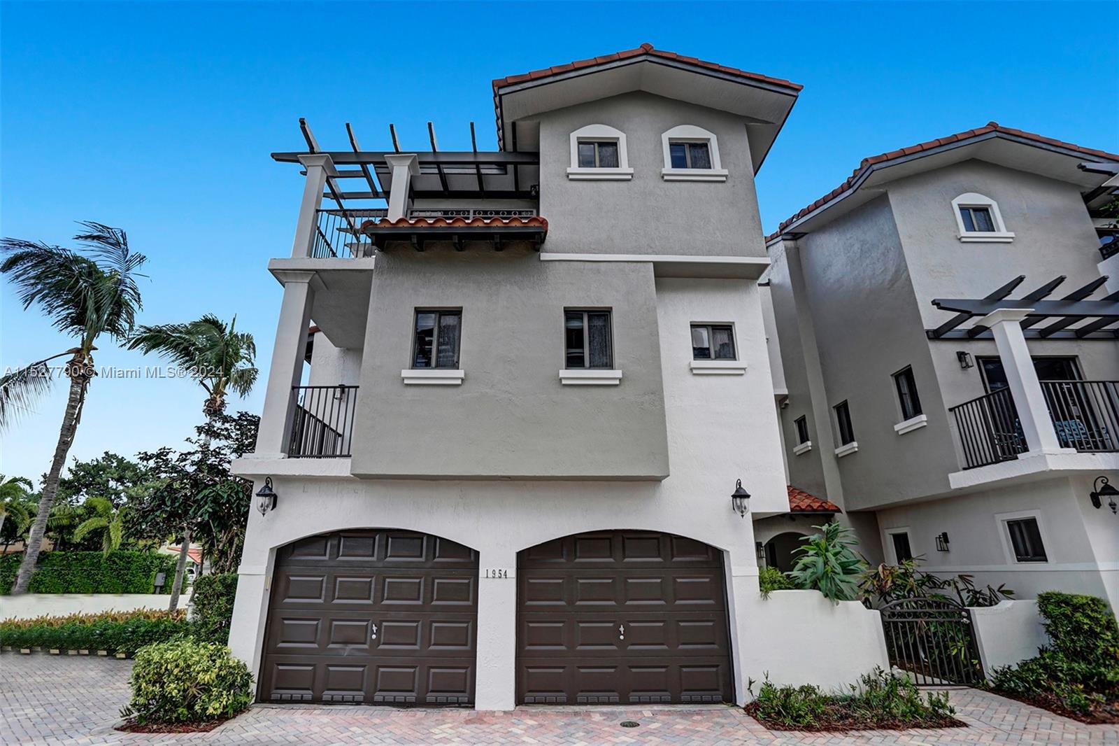 Ocean Vue Deerfield Beach, FL 33441 - Photo 92 of 93 a front view of a house with a yard