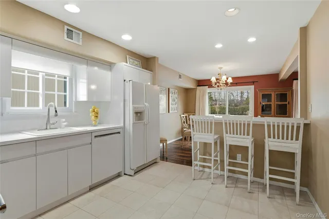 a kitchen with a sink and a window