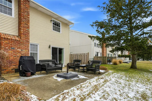 a view of a dinning table and chairs in the patio