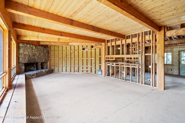 a view of a room with a large window