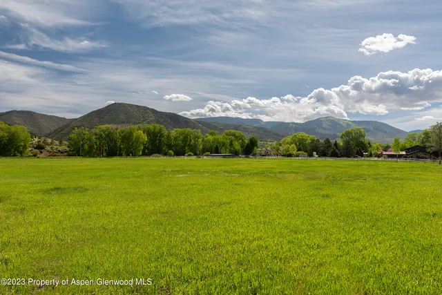 a view of a lake with a mountain in the background