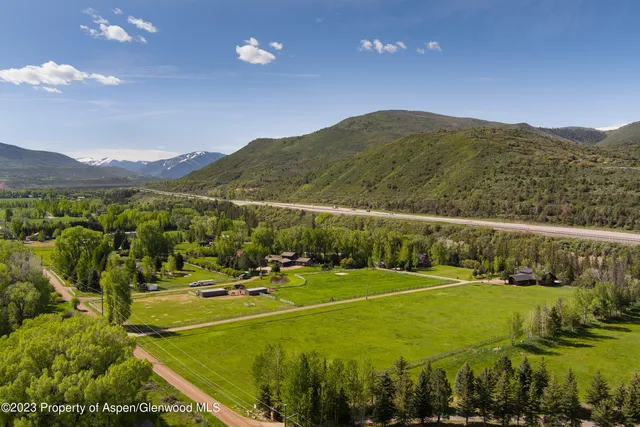 a view of an aerial view of tennis court