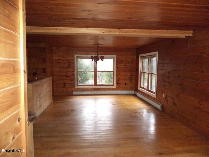 11 Lake View Road Peru, MA 01235 - Photo 3 of 15 a view of an empty room and window