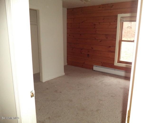 11 Lake View Road Peru, MA 01235 - Photo 8 of 15 a view of an empty room with a window