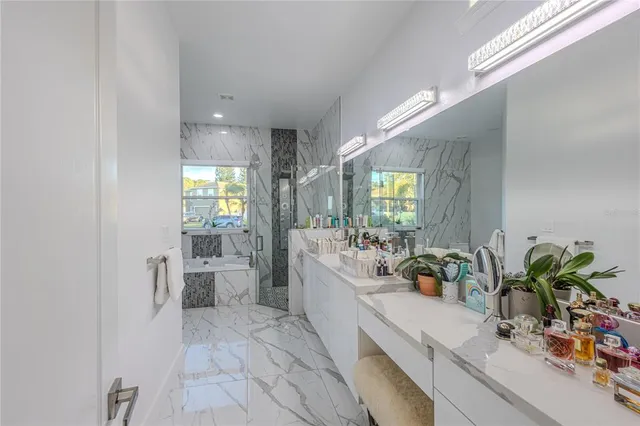 a front view of a house with garden and porch