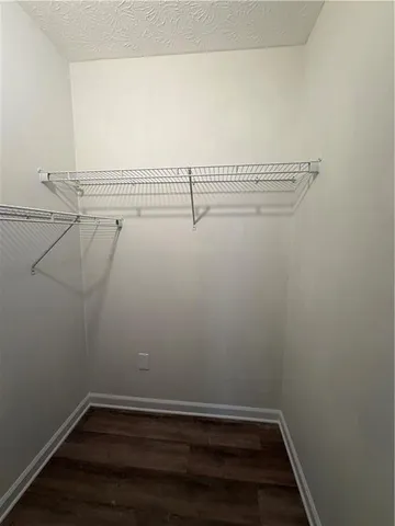 a view of a room with racks on the wall