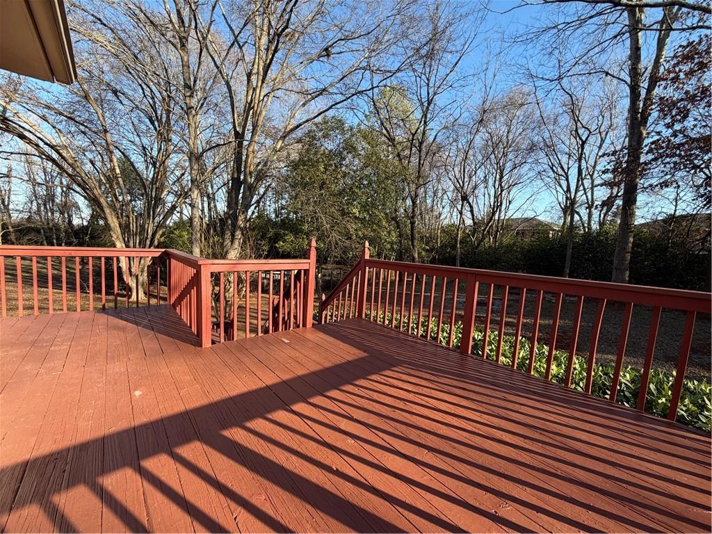 3056 Mill Falls Court Duluth, GA 30097 - Photo 28 of 31 a view of a wooden deck with a bench