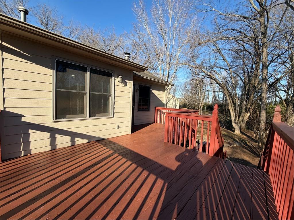 3056 Mill Falls Court Duluth, GA 30097 - Photo 29 of 31 a view of a roof deck with wooden floor and fence