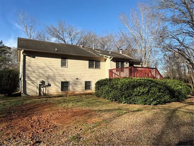 a front view of house with garden