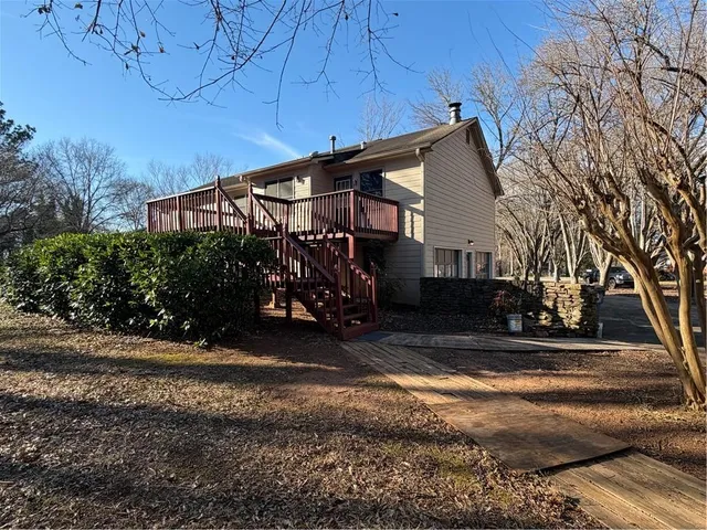 a view of a house with a street