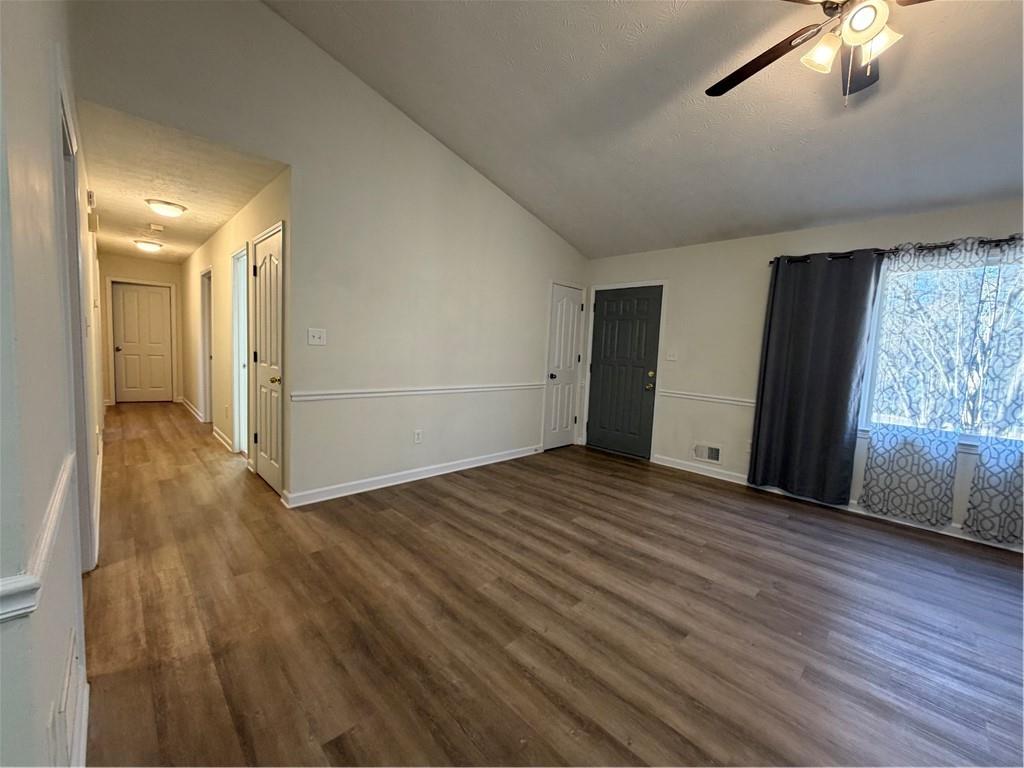 3056 Mill Falls Court Duluth, GA 30097 - Photo 6 of 31 an empty room with wooden floor and windows