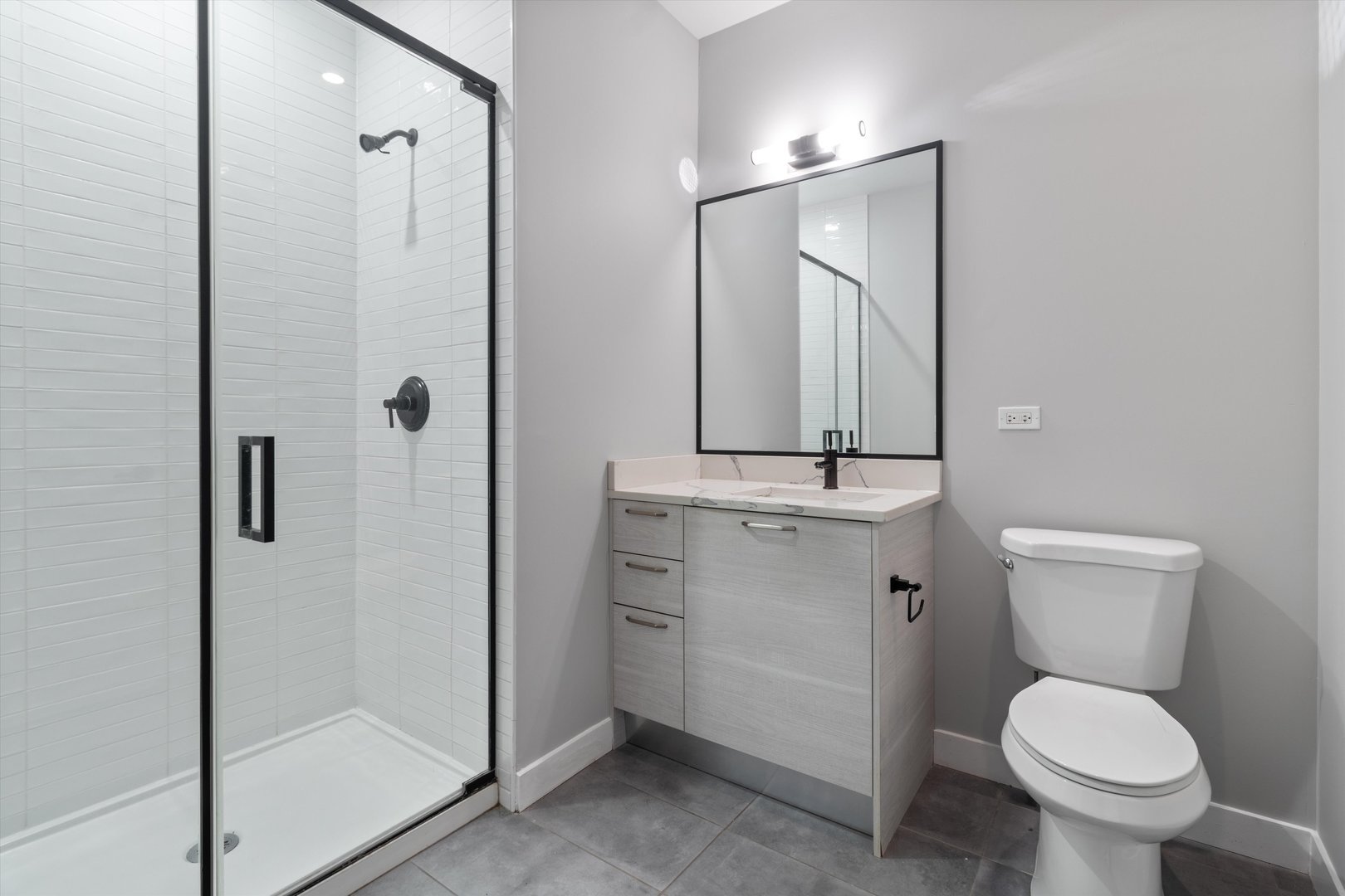 Undisclosed Address Chicago, IL 60610 - Photo 8 of 13 a bathroom with a toilet sink and shower