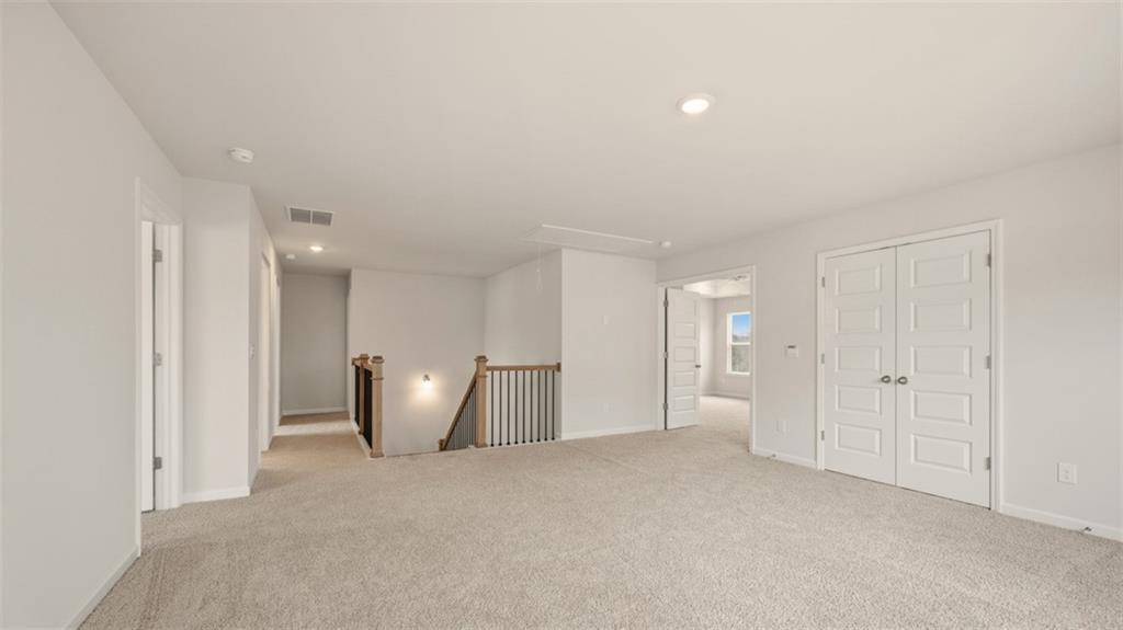 1780 Goodwin Drive Hampton, GA 30228 - Photo 23 of 40 a view of an empty room with a fireplace
