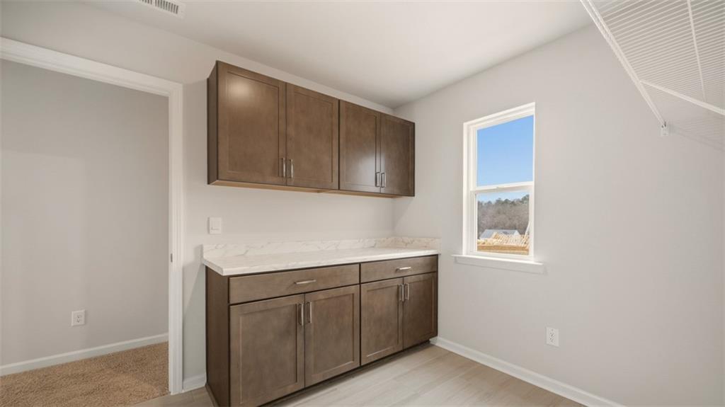 1780 Goodwin Drive Hampton, GA 30228 - Photo 32 of 40 a room with a sink cabinets and utility room