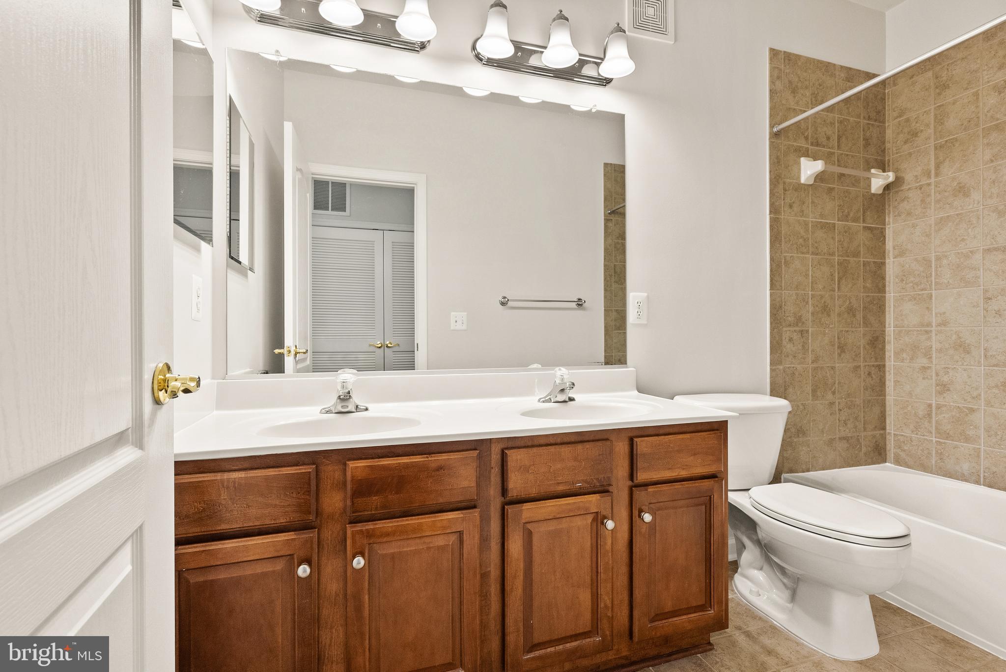 22678 Verde Gate Terrace Brambleton, VA 20148 - Photo 30 of 36 Upper Level Hall Bath - Double Vanity