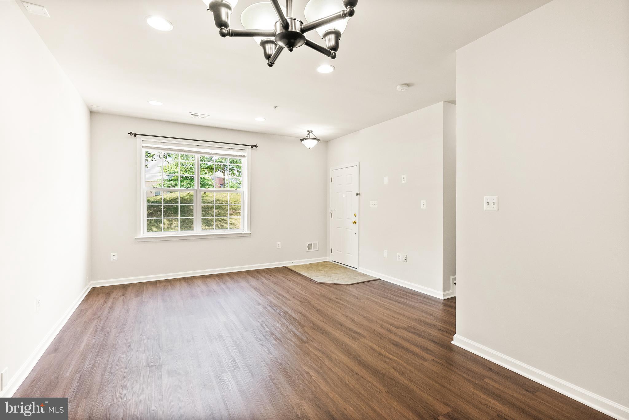 22678 Verde Gate Terrace Brambleton, VA 20148 - Photo 9 of 36 Dining Room to Living Room