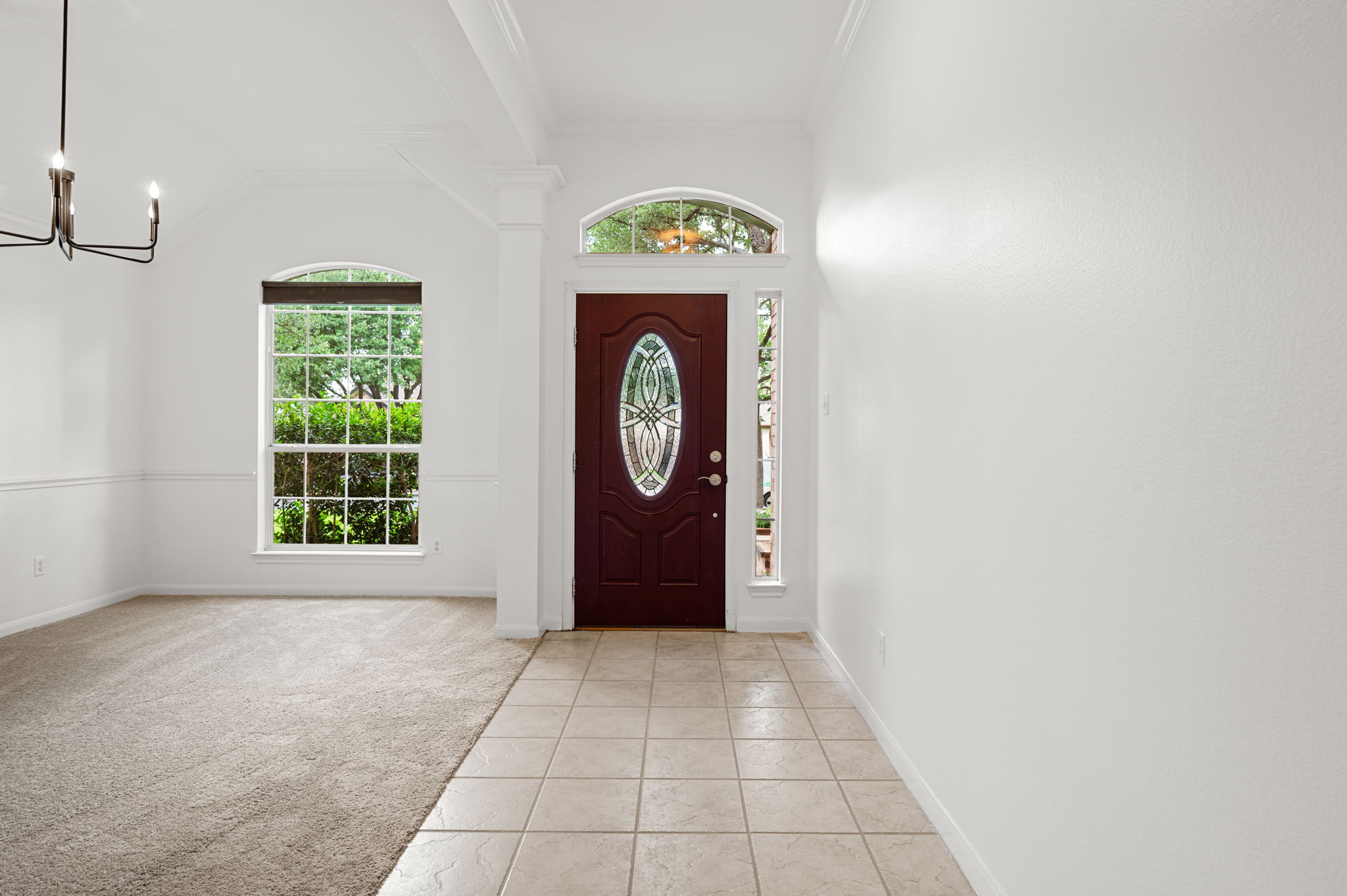 9201 La Siesta Bend Austin, TX 78749 - Photo 3 of 37 a view of a entryway in a hall with a window