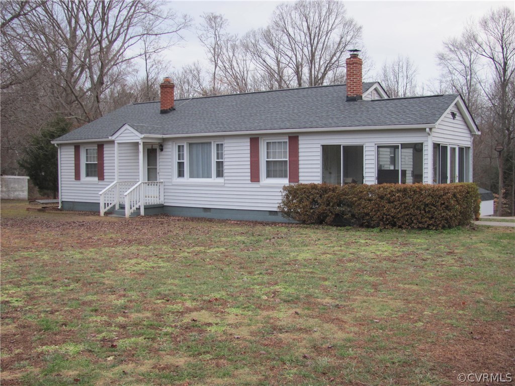 16160 Tyler Station Road Beaverdam, VA 23015 - Photo 1 of 17 a front view of a house with garden