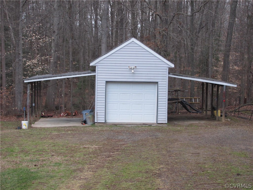 16160 Tyler Station Road Beaverdam, VA 23015 - Photo 14 of 17 a front view of a house with garage
