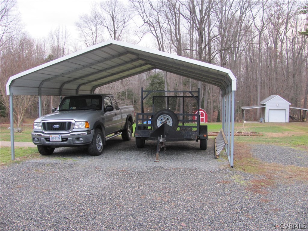 16160 Tyler Station Road Beaverdam, VA 23015 - Photo 15 of 17 a view of car parked in garage