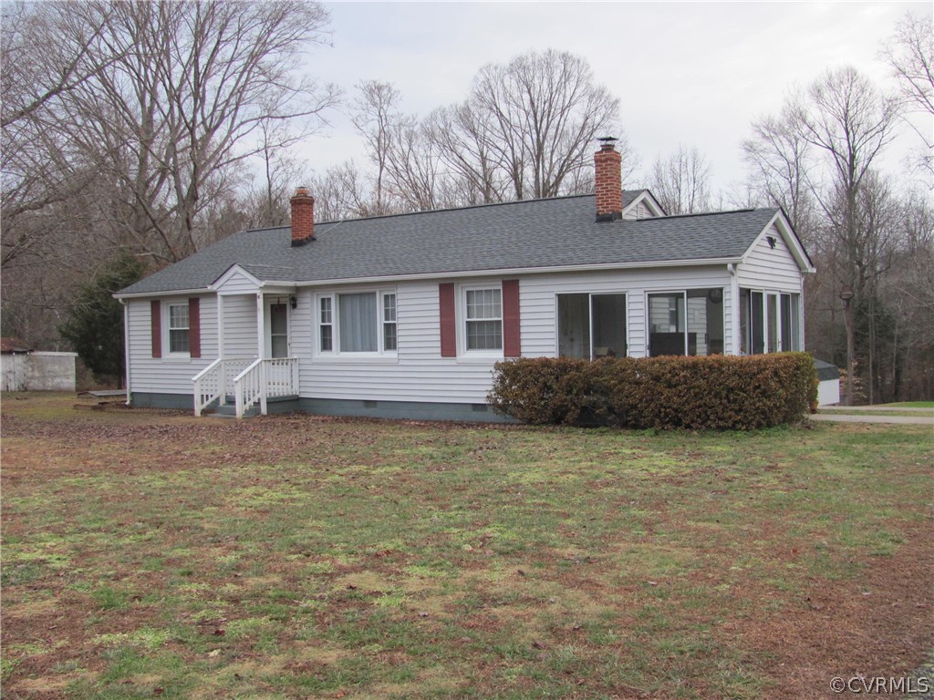16160 Tyler Station Road Beaverdam, VA 23015 - Photo 2 of 17 a front view of a house with a garden