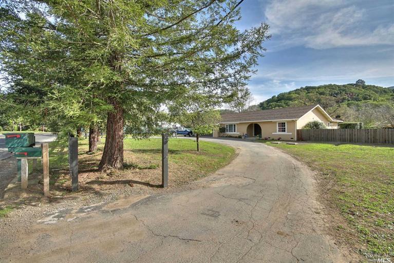 1803 Indian Valley Road Novato, CA 94947 - Photo 1 of 1 a view of a house with backyard and tree