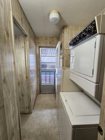 a view of hallway with windows