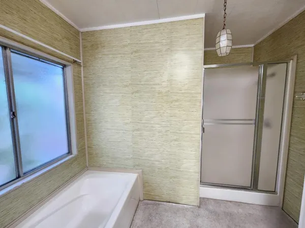 a view of a porch and wooden floor